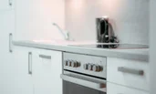Kitchen with a stove, dishwasher, and coffee machine | © All rights reserved