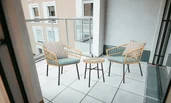Terrace with a table and chairs, overlooking the garden for relaxation. | © All rights reserved
