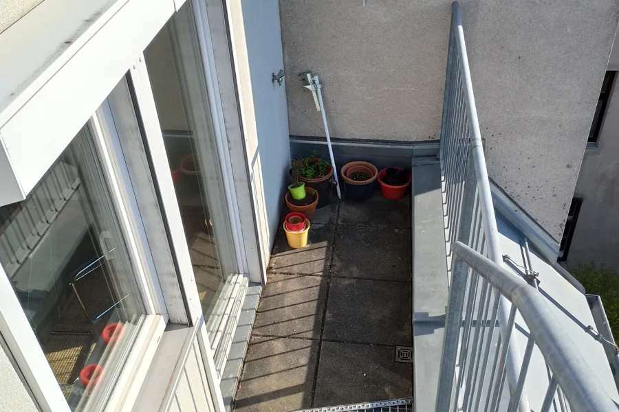 Balkon und Treppe zur Terasse