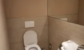 Private toilet with sink