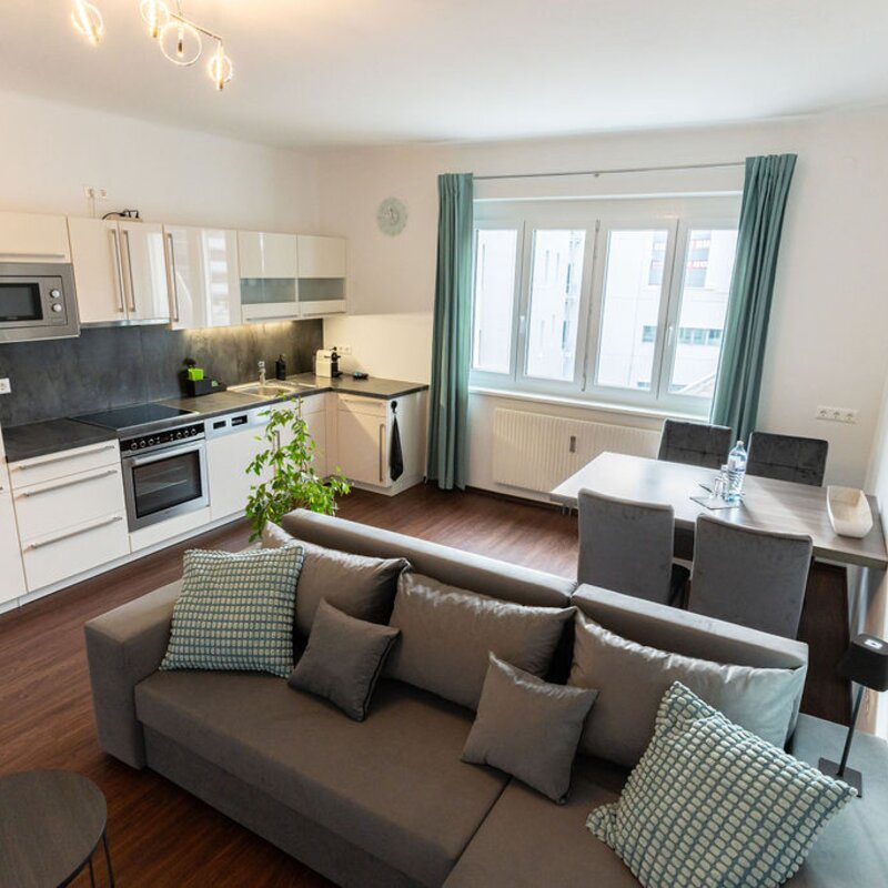 Bright 2-room apartment with open kitchen & living area – short-term rental Graz, temporary housing for 1 to 6 months.