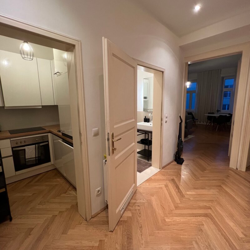 Entrance hall with view of kitchen, bathroom and living room