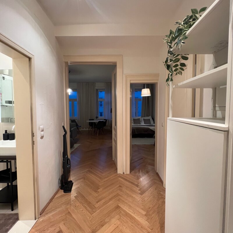Entrance hall with view of living room and bedroom