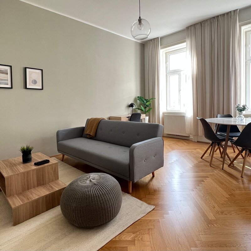 Living and dining room with a view of the quiet street