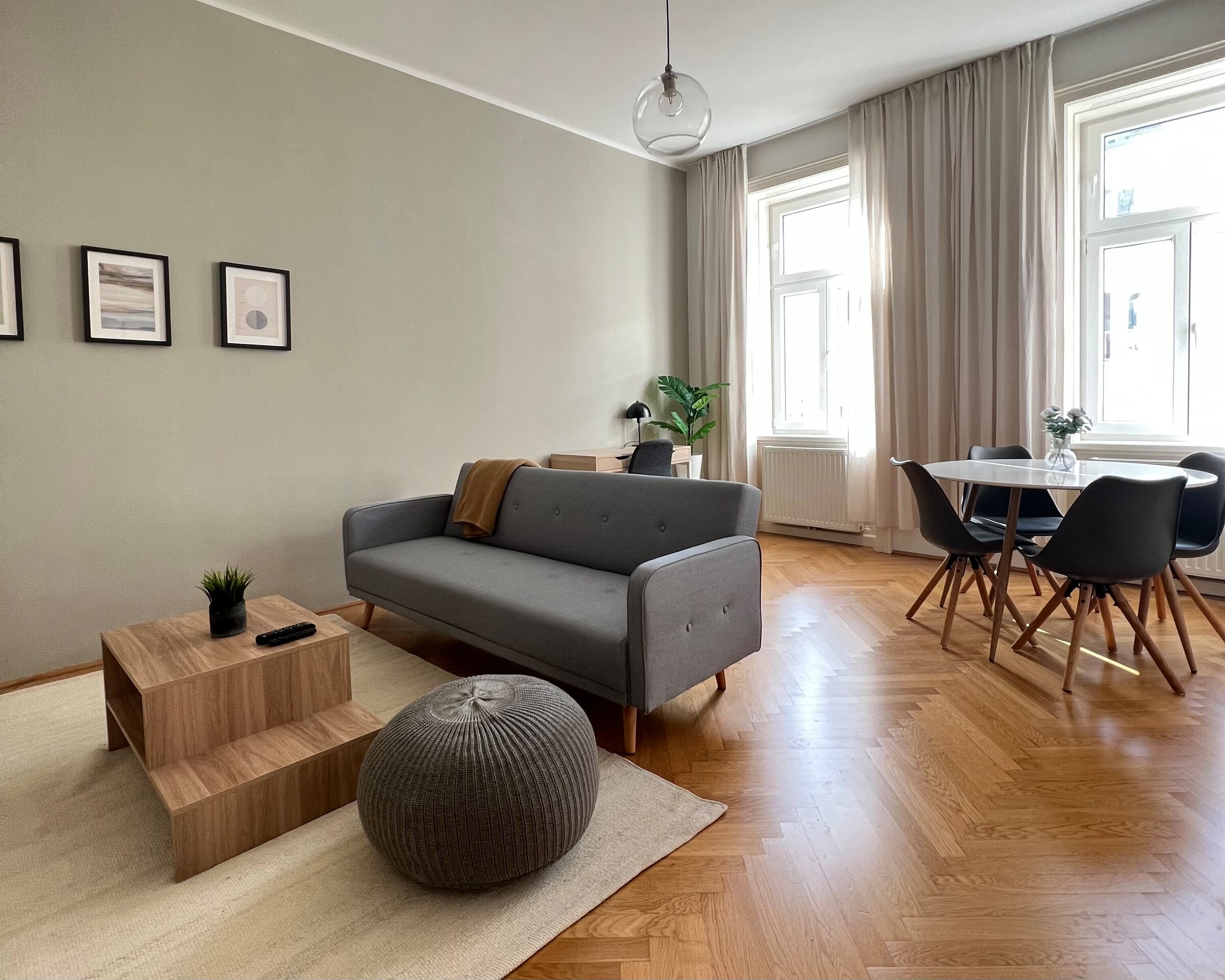 Living and dining room with a view of the quiet street