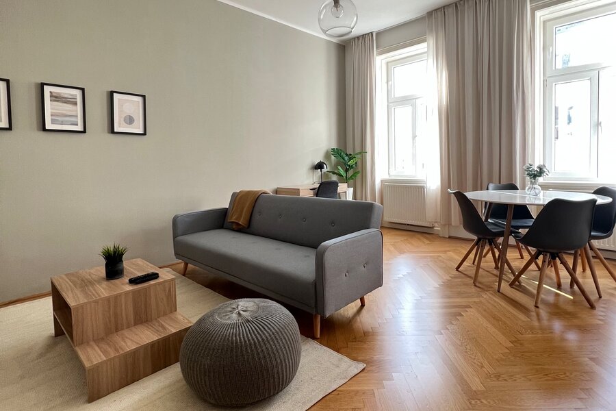 Living and dining room with a view of the quiet street