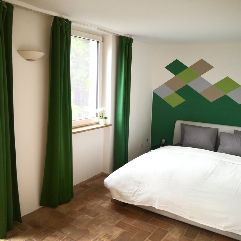 Schlafzimmer mit direktem Zugang zur Terrasse