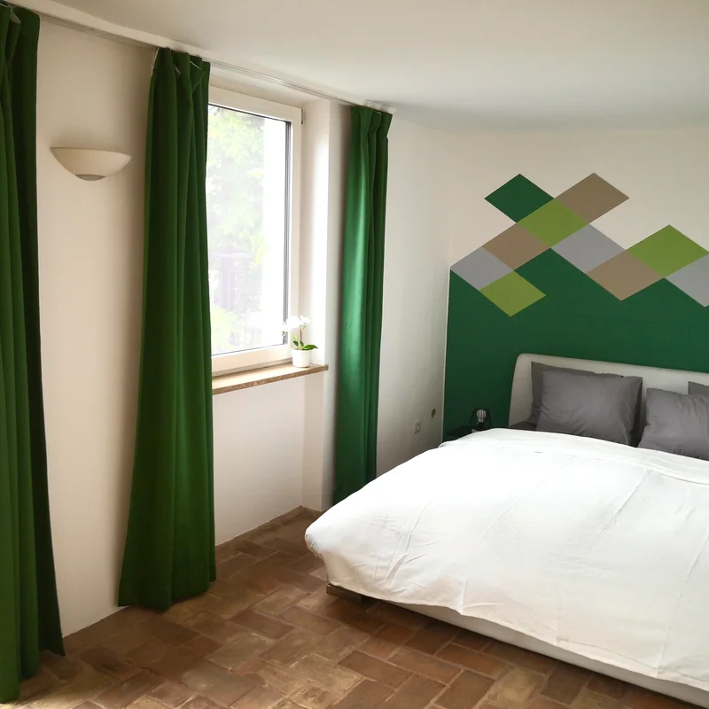 Schlafzimmer mit direktem Zugang zur Terrasse