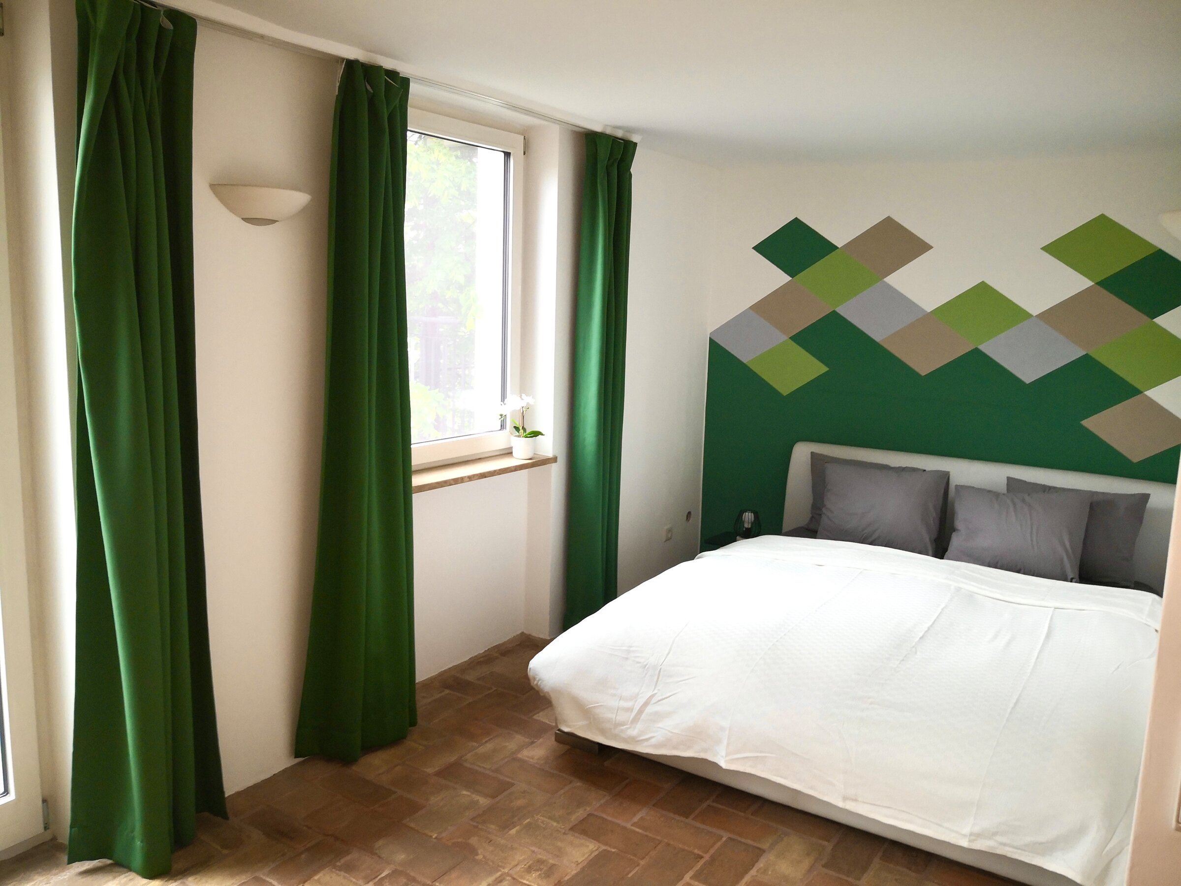 Schlafzimmer mit direktem Zugang zur Terrasse