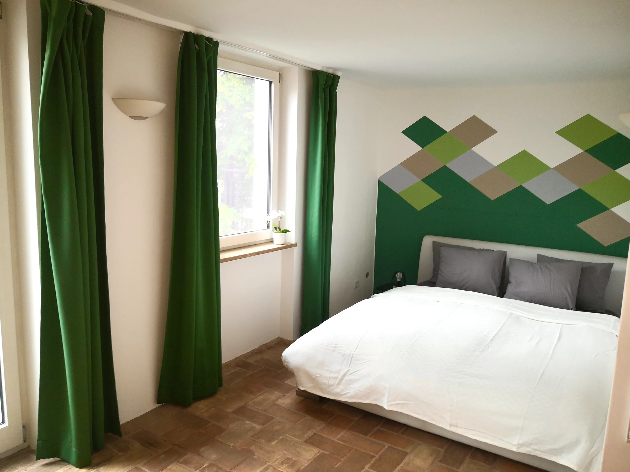 Schlafzimmer mit direktem Zugang zur Terrasse