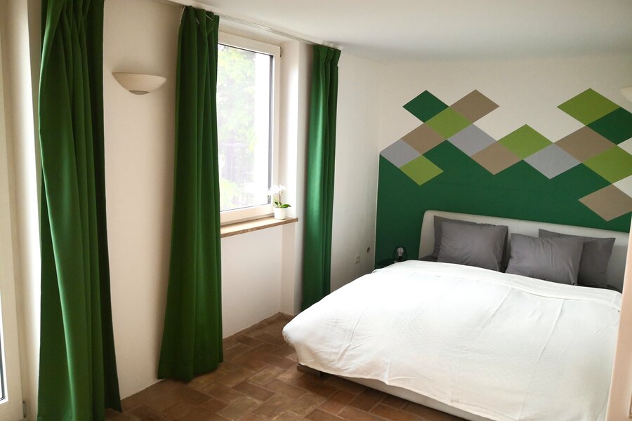 Schlafzimmer mit direktem Zugang zur Terrasse