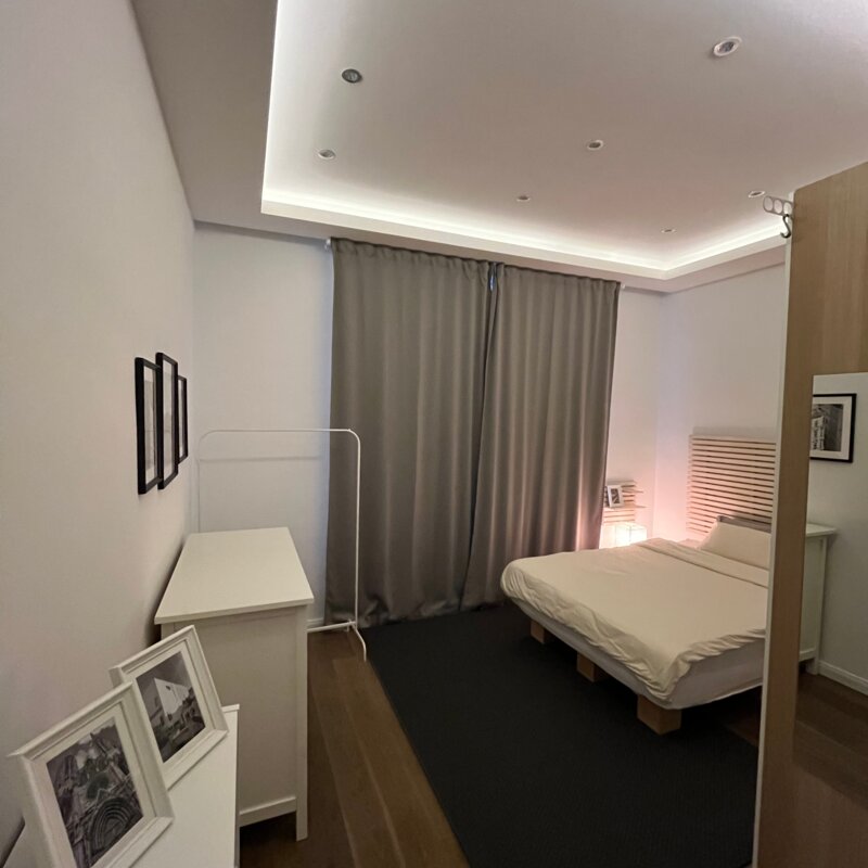 Bedroom with black-out curtain