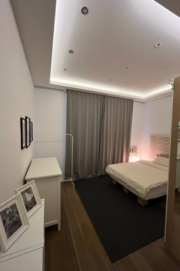 Bedroom with black-out curtain