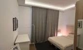 Bedroom with black-out curtain