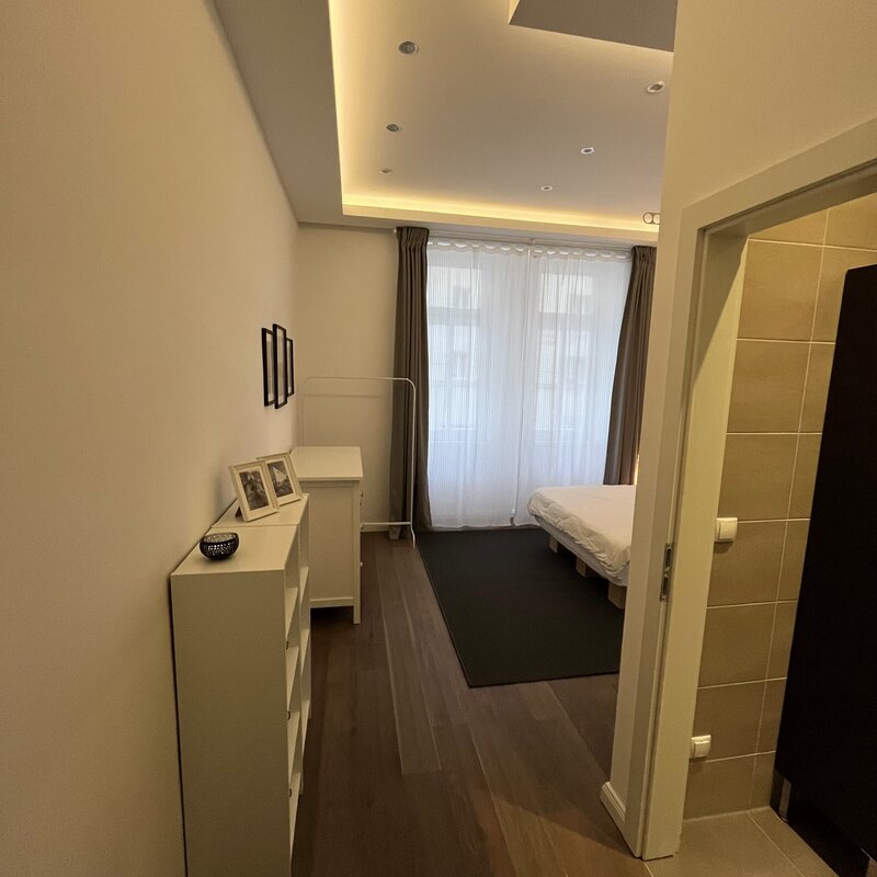 View towards the bedroom with entrance to the bathroom