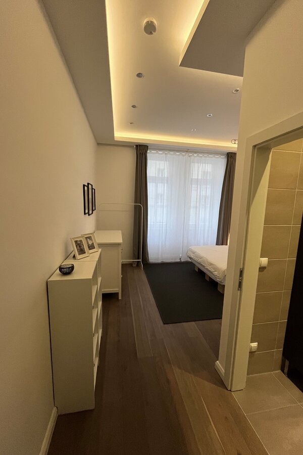 View towards the bedroom with entrance to the bathroom