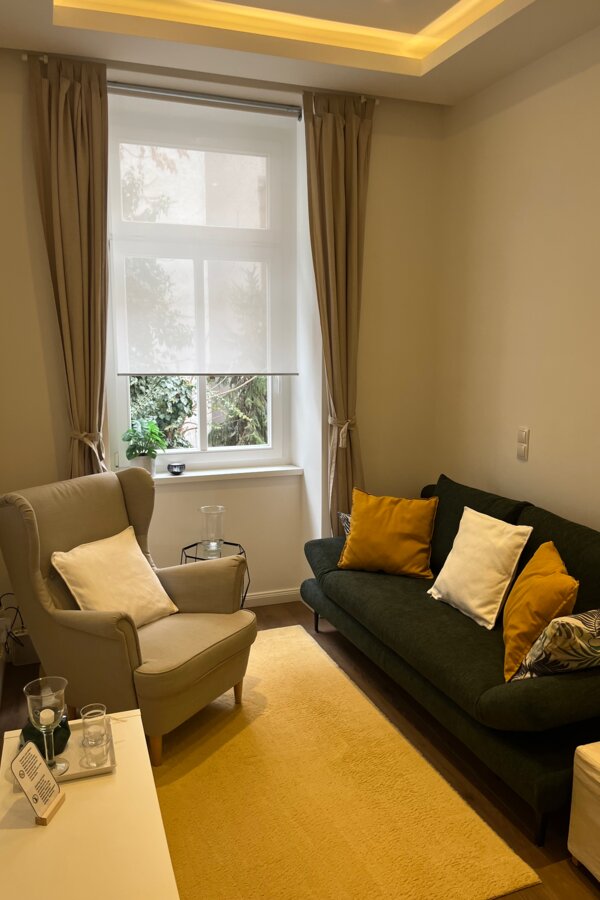 Living/dining room: sofa and armchair 