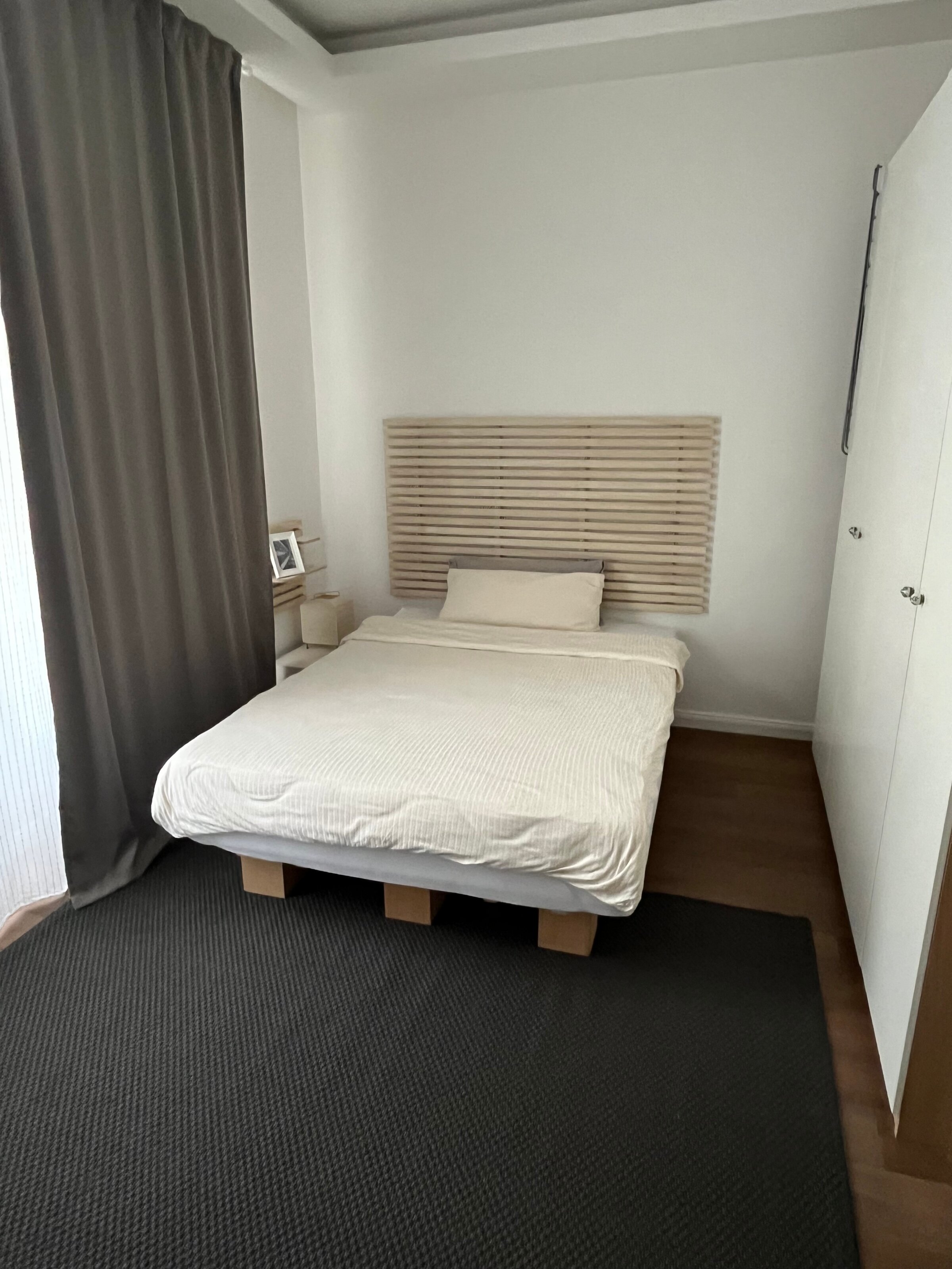 Sleeping/work area: bed with wardrobes