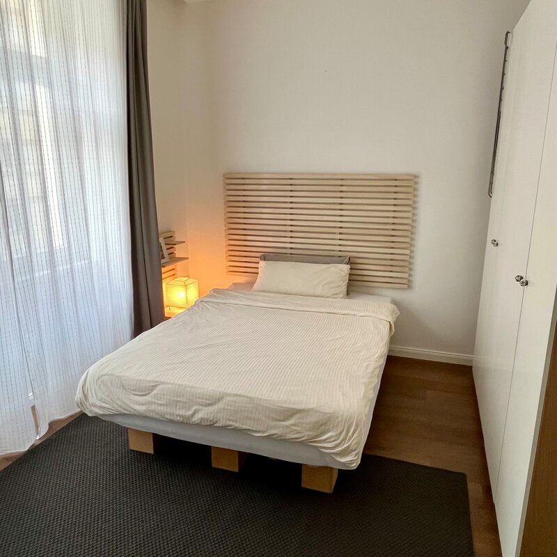 Sleeping/work area: bed with wardrobes