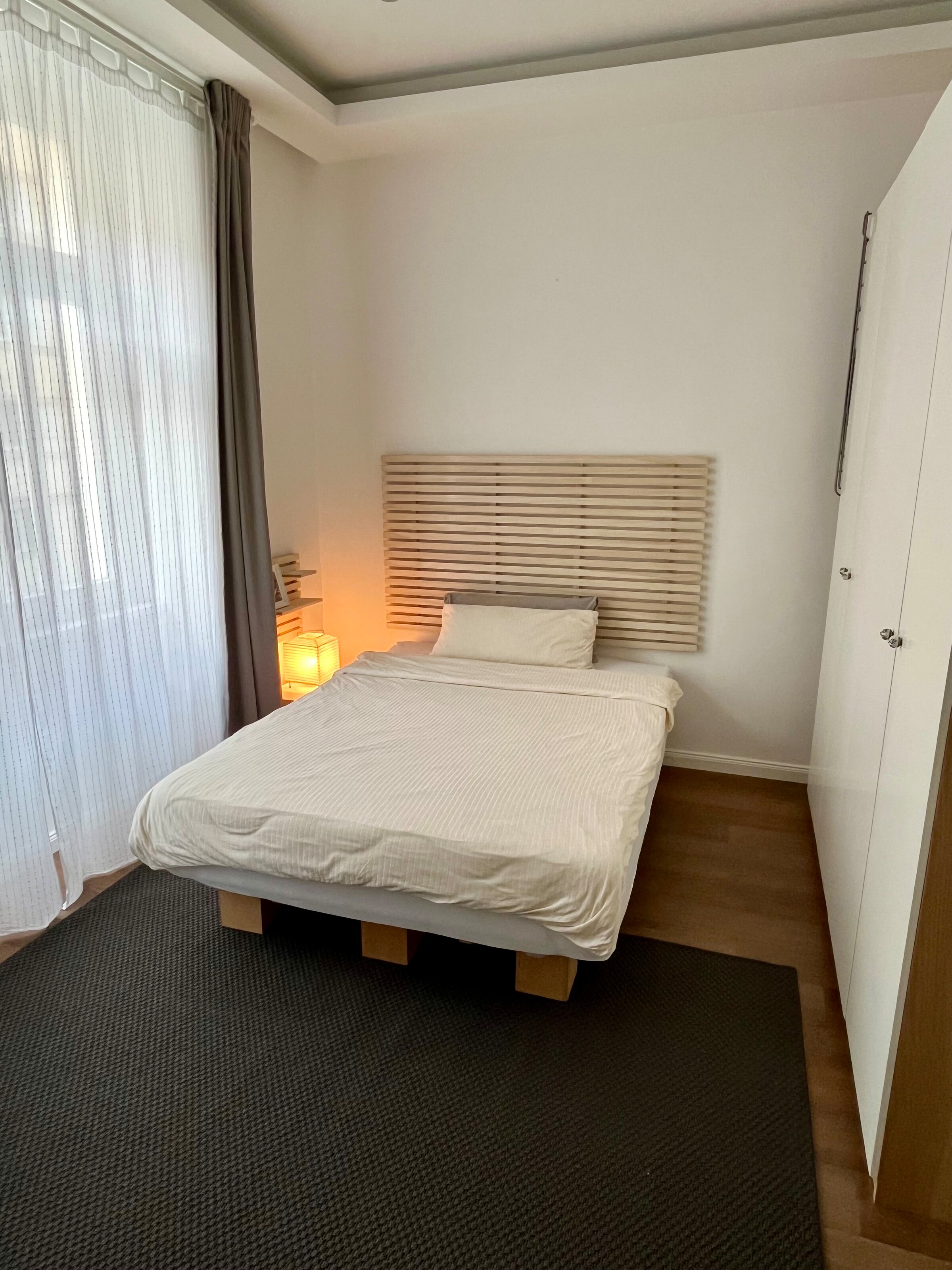 Sleeping/work area: bed with wardrobes