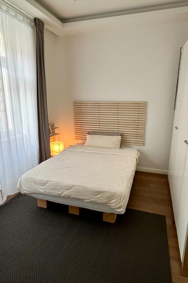 Sleeping/work area: bed with wardrobes