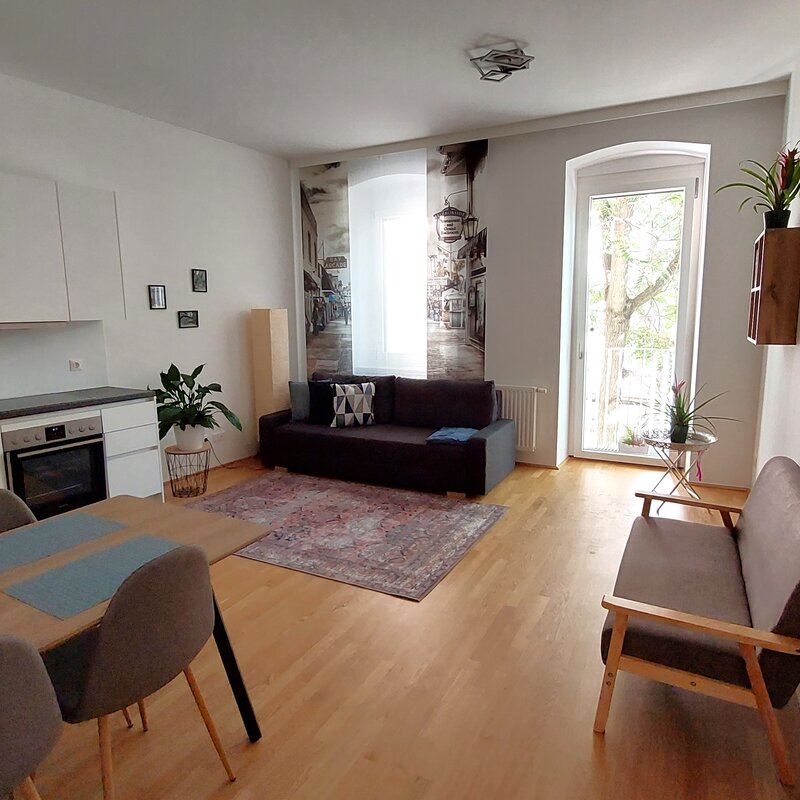Bright 2-room apartment with open kitchen & balcony – short-term rental Vienna, temporary housing for 1 to 6 months