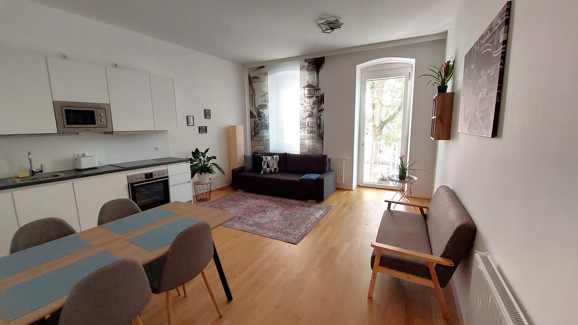 Bright 2-room apartment with open kitchen & balcony – short-term rental Vienna, temporary housing for 1 to 6 months