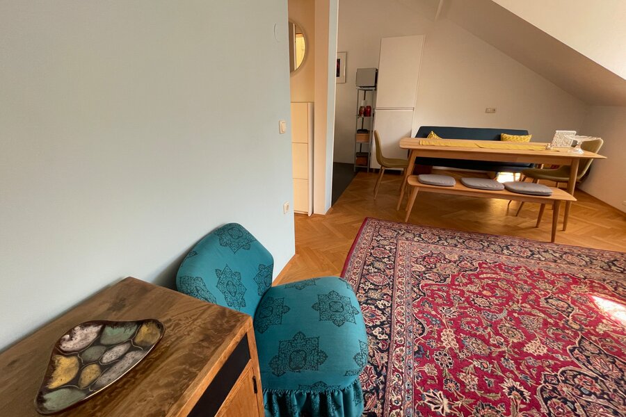 The flat is furnished using both modern and vintage furniture.