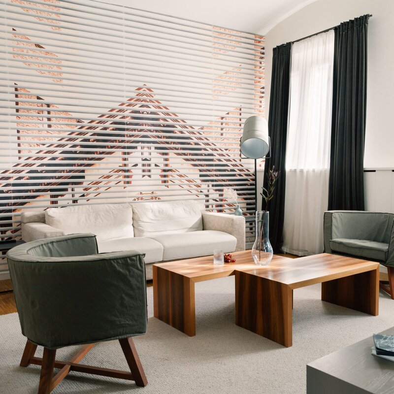 Stilvolles Wohnzimmer mit Designermöbeln – 2-Zimmer Apartment zur Kurzzeitmiete, Wohnen auf Zeit für 1 bis 6 Monate in Wien