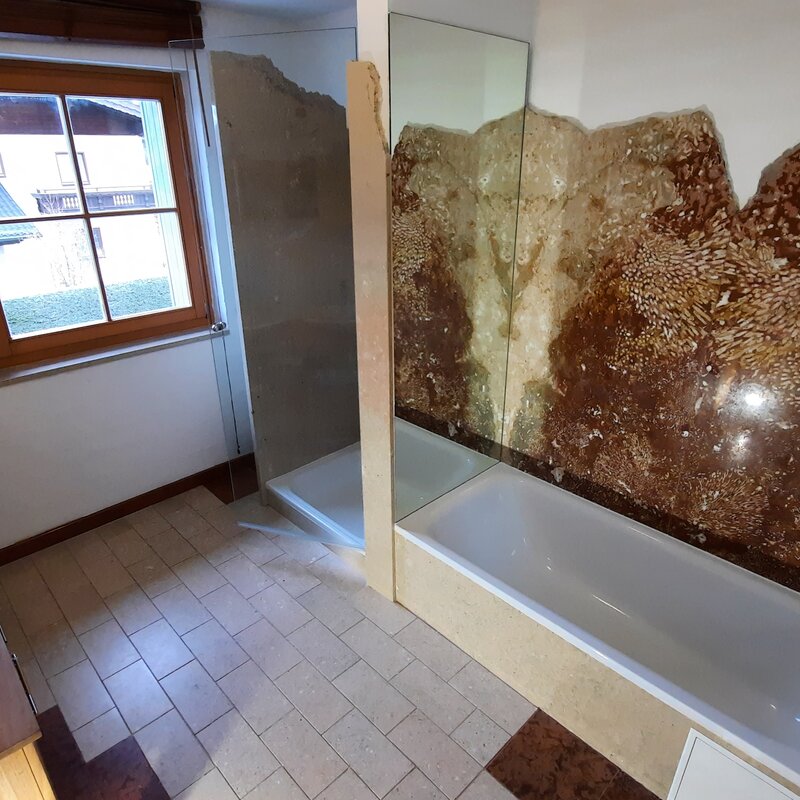 Bathroom with shower and bathtub