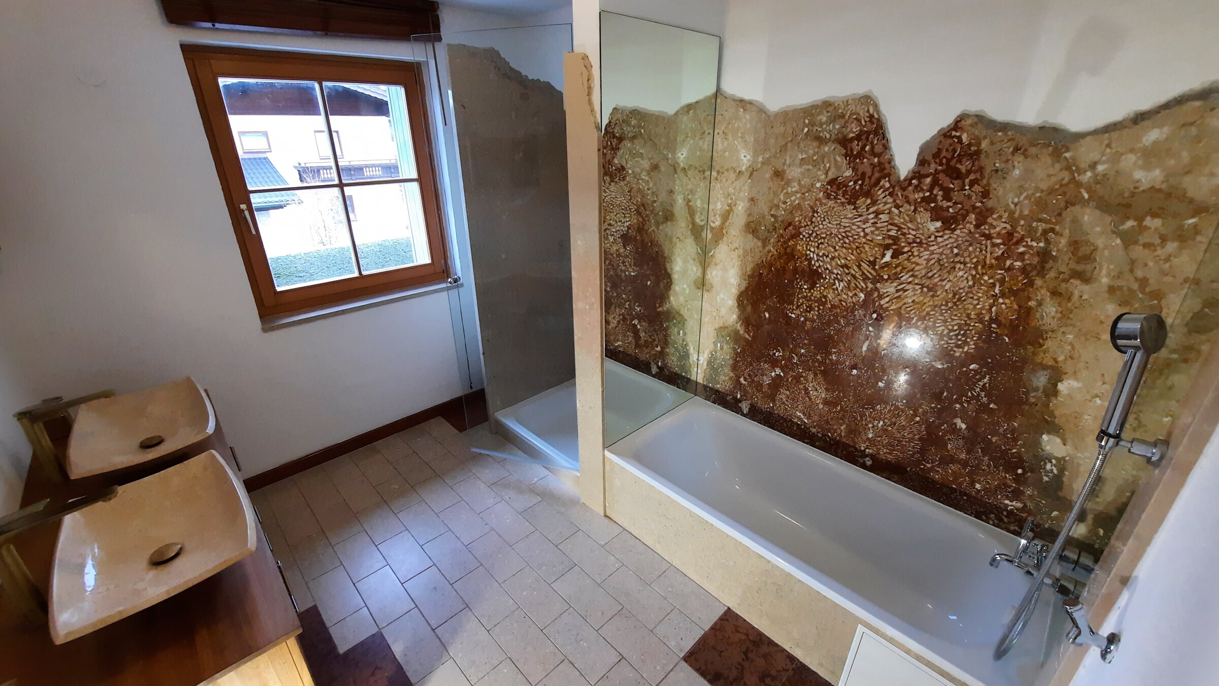 Bathroom with shower and bathtub