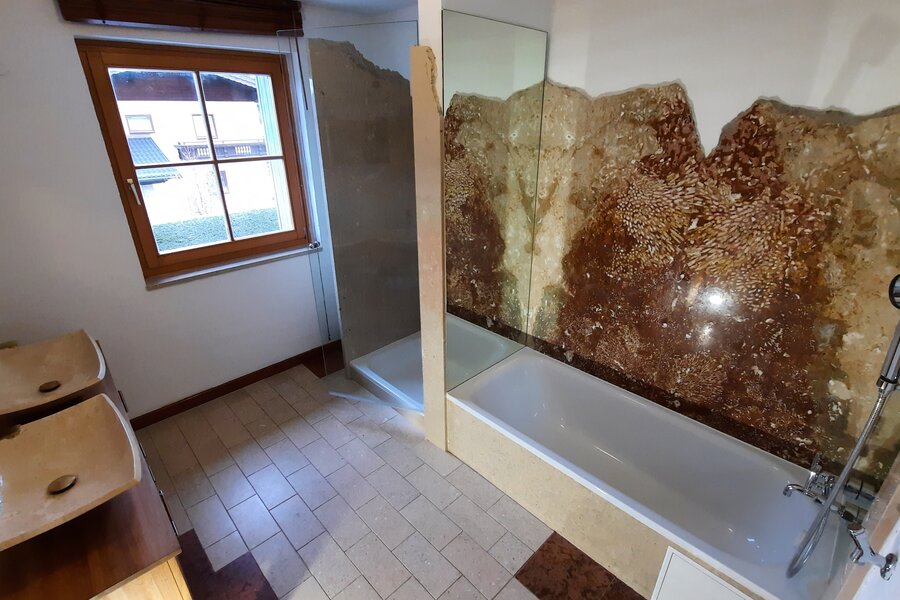 Bathroom with shower and bathtub