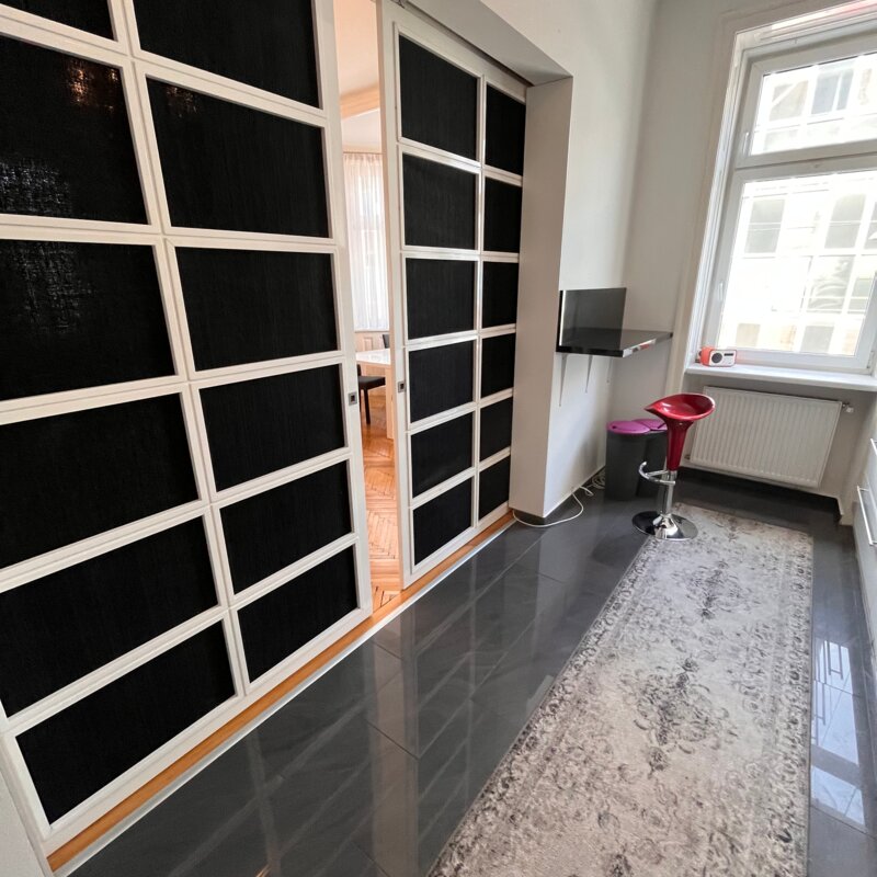 Sliding door between kitchen and living room