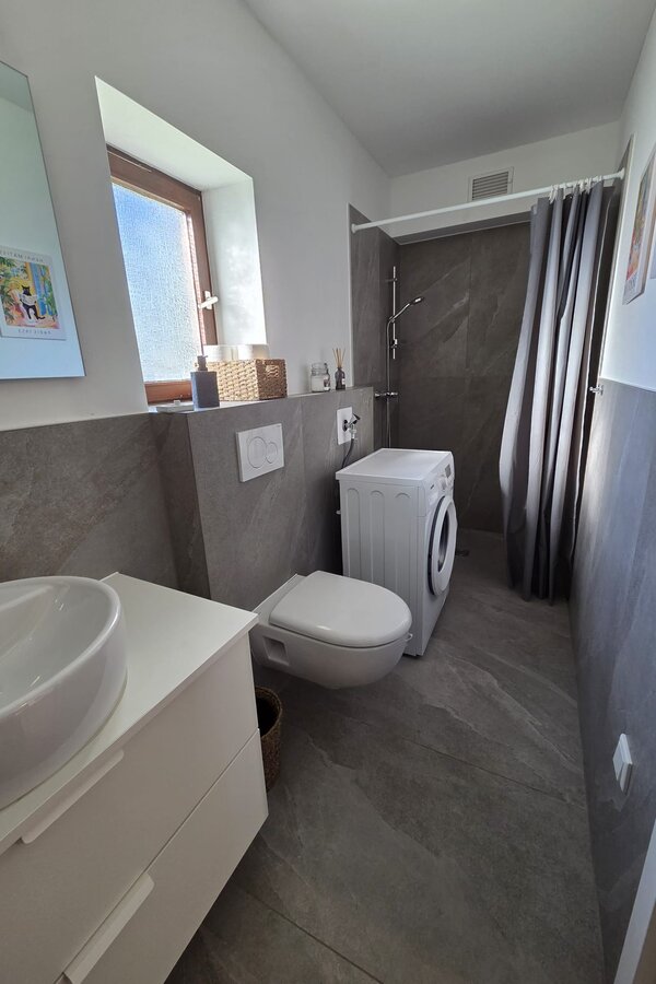 Bathroom with washing machine