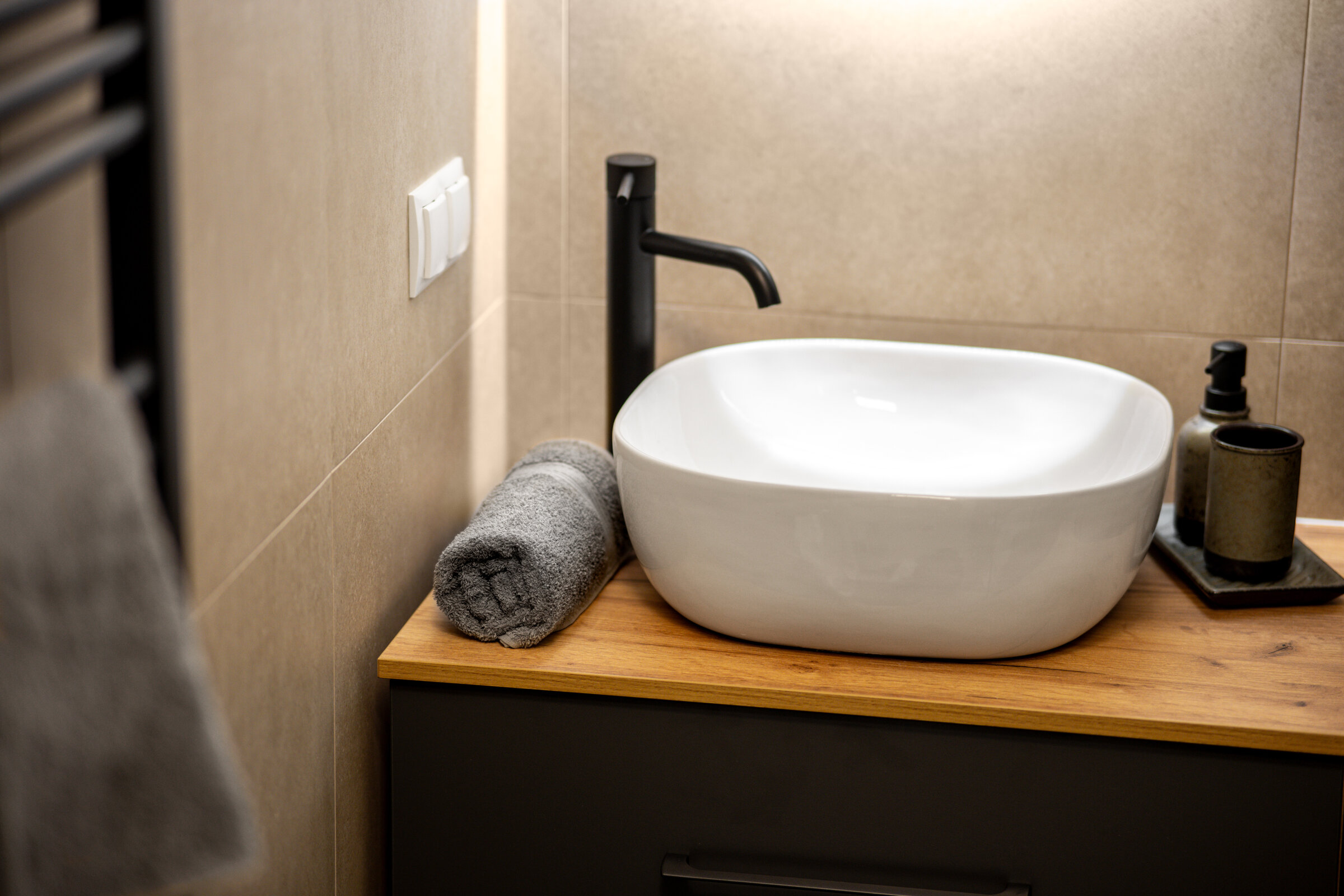 Stylish bathroom with towels and free toiletries