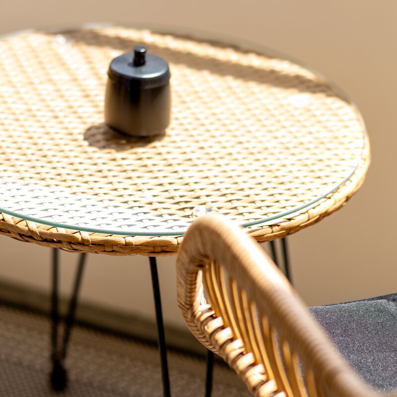Outdoor dining area on the sunny balcony