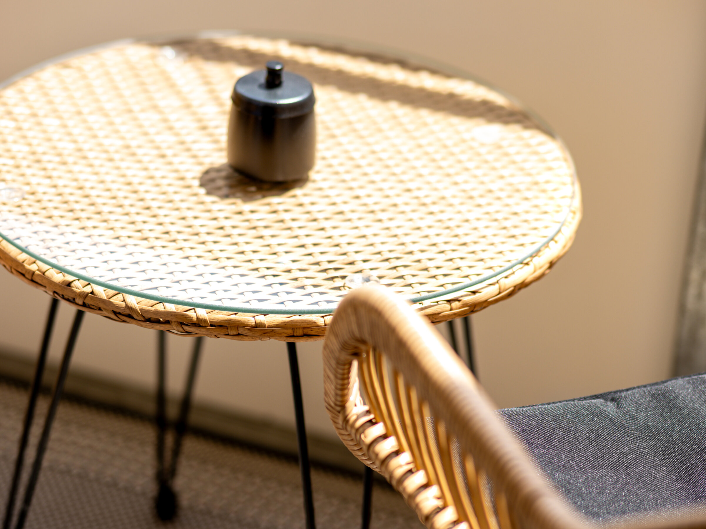 Outdoor dining area on the sunny balcony