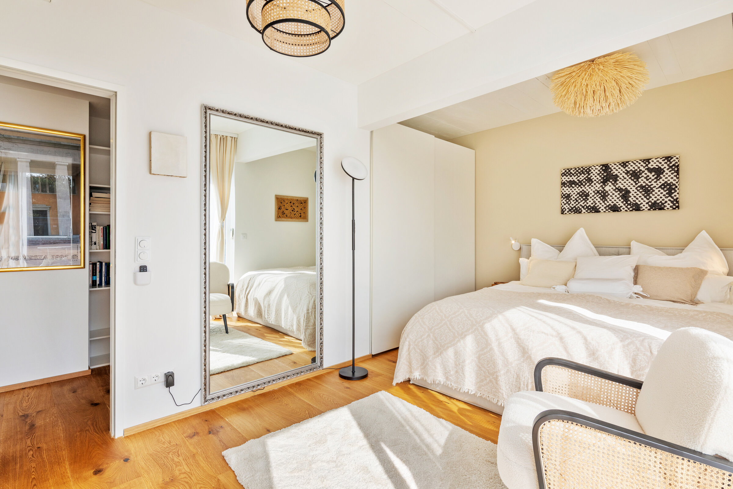 Bedroom with door to the hallway and bathroom