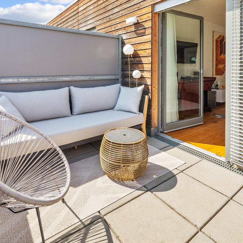 outdoor sofa and entrance to living area