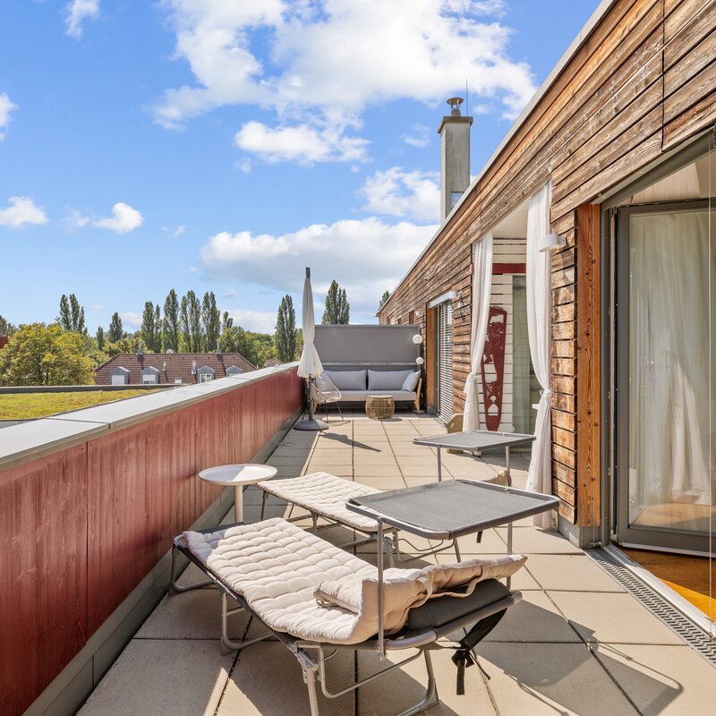 View to the entire terrace and sun beds