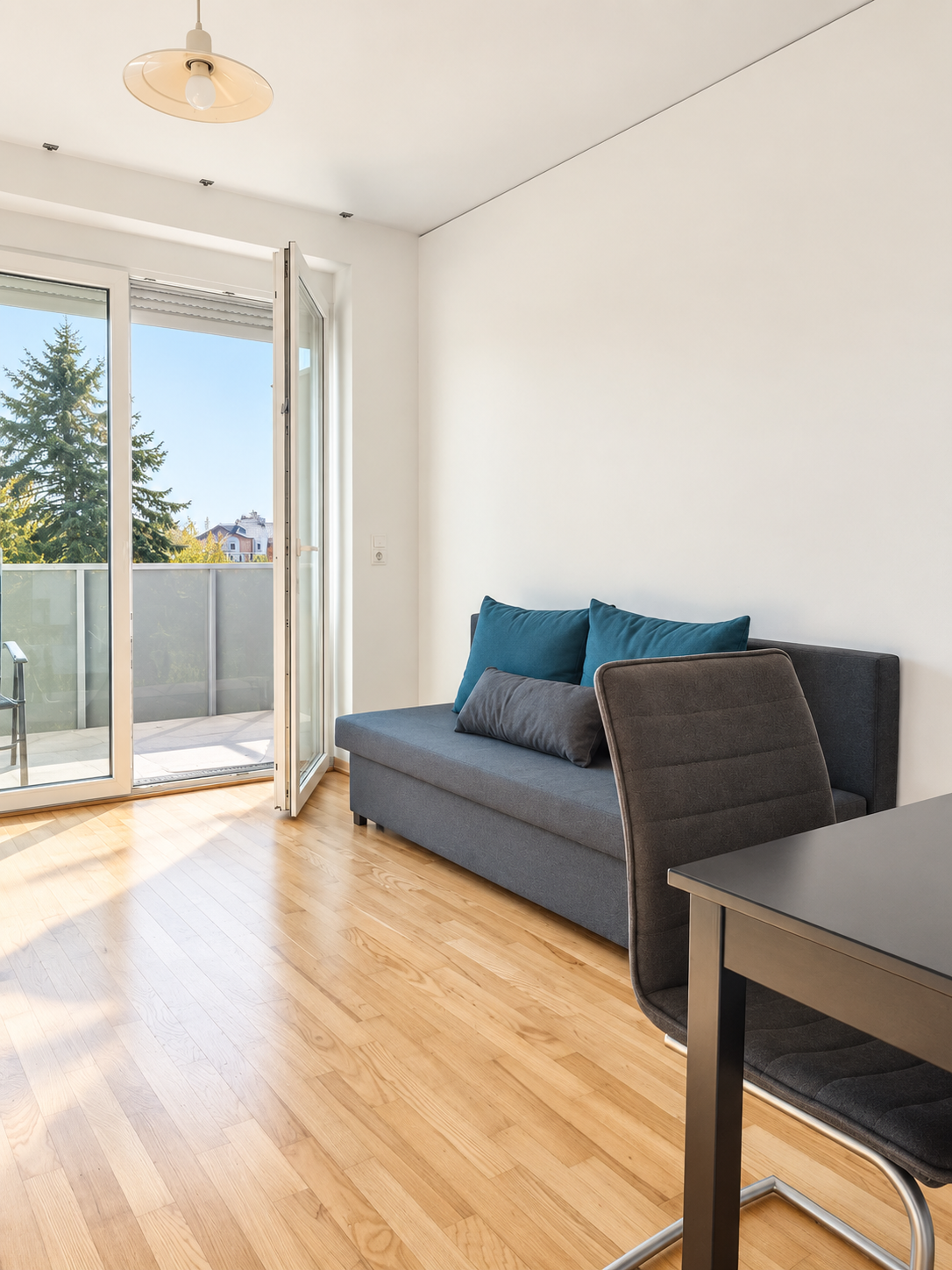 Bright living room with balcony – 2-room apartment for short-term rental & temporary housing for 1 to 6 months in Graz