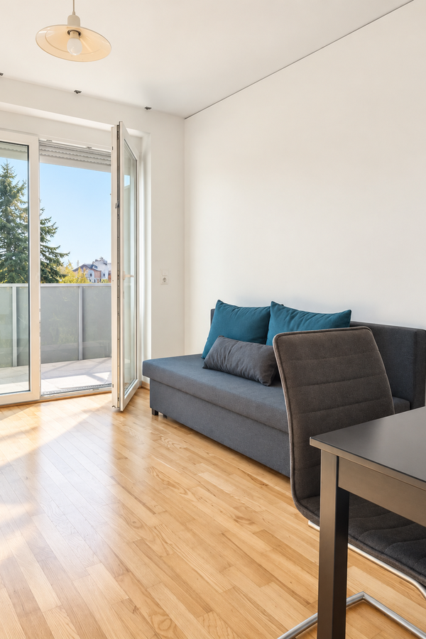 Bright living room with balcony – 2-room apartment for short-term rental & temporary housing for 1 to 6 months in Graz