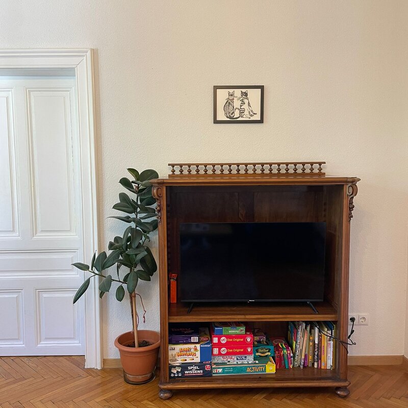 Wohnzimmer Tv mit Kinderspielbereich