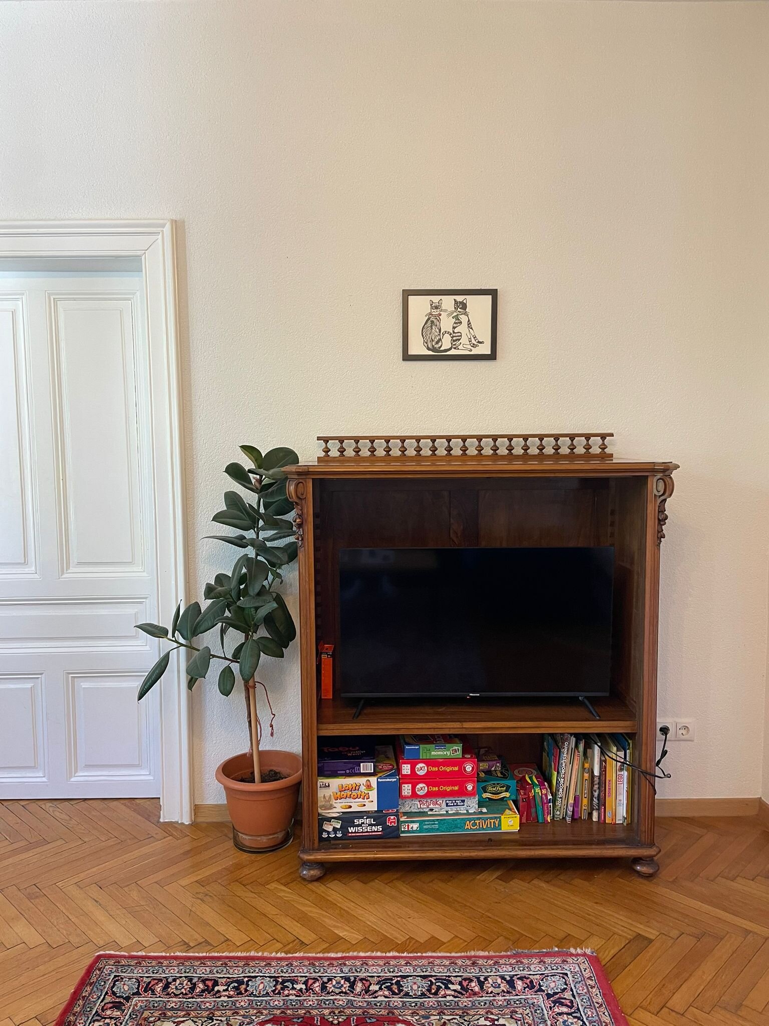 Wohnzimmer Tv mit Kinderspielbereich