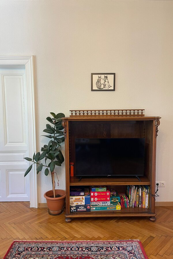 Wohnzimmer Tv mit Kinderspielbereich