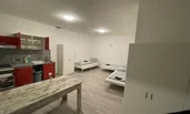 Erste Schlafzimmer mit Küche 