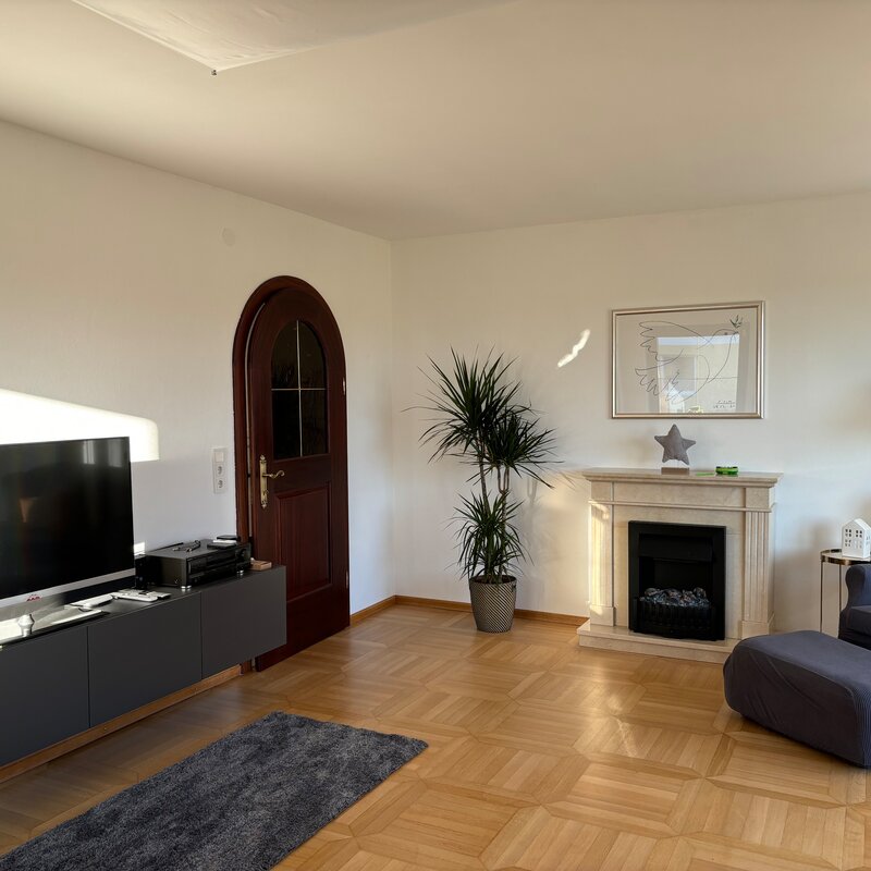 Reading corner, fireplace and TV