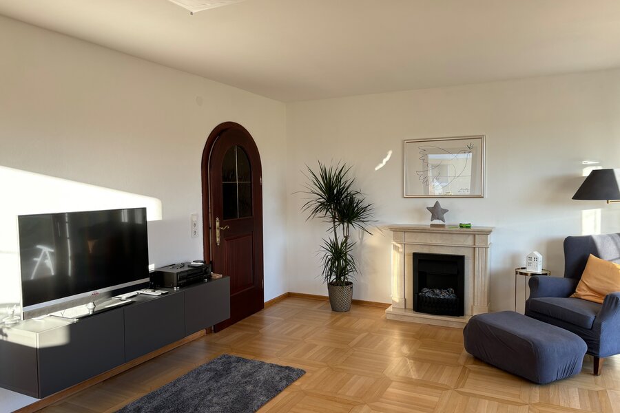 Reading corner, fireplace and TV
