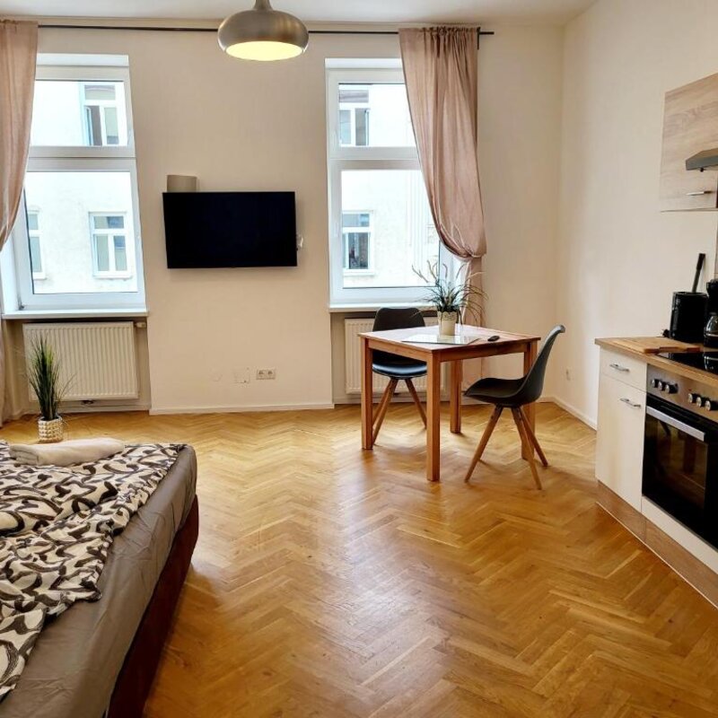 Furnished studio apartment with kitchenette & parquet floor – short-term rental Vienna, temporary housing for 1 to 6 months