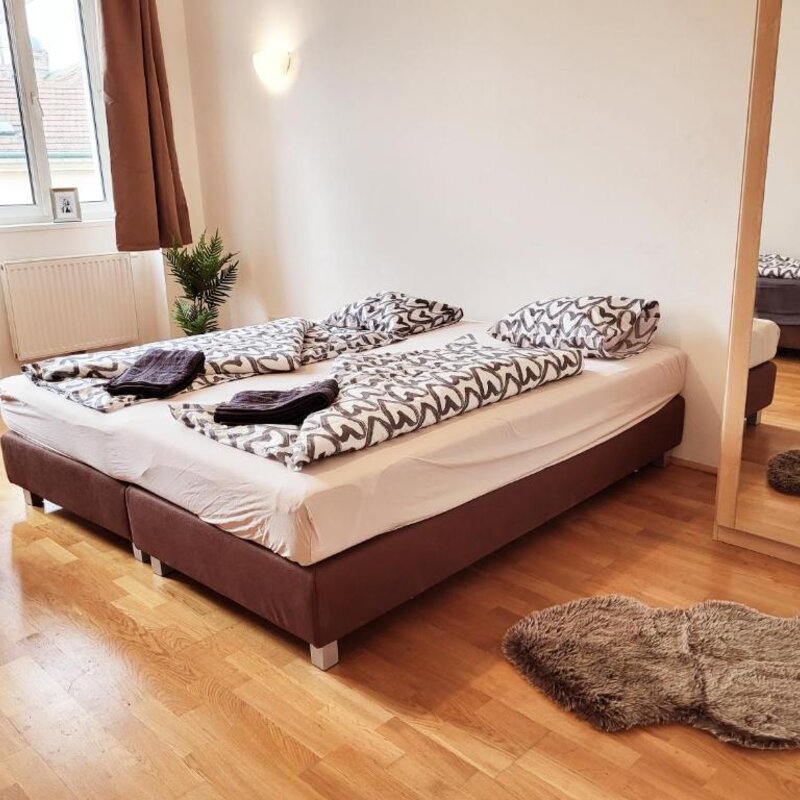 Helles Studio-Apartment mit Doppelbett & Parkettboden – Kurzzeitmiete & Wohnen auf Zeit für 1 bis 6 Monate in Floridsdorf